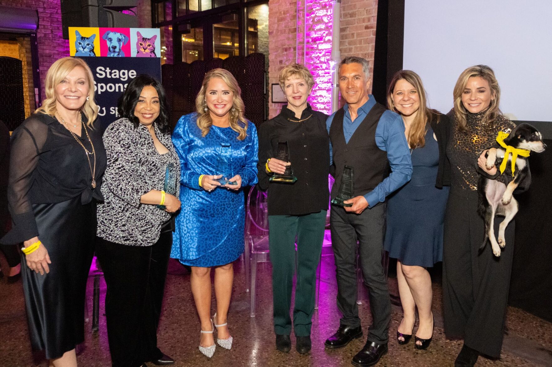 PAWS founder and Executive Chair Paula Fasseas, 2024 Award Winners Ramona Griffin, Melissa Canning, Claudia Langman and James Pszanka, with Executive Director Alexis Fasseas, CEO Susanna Wickham. (Photo PAWS Chicago)
